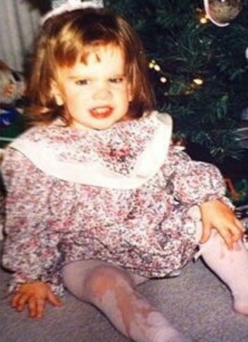 Childhood Picture of Brooke Palsson wearing gown